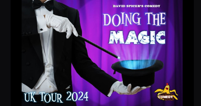 A magician waves his wand over a top hat. It says DAVID SPICER